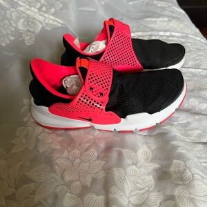 Nike Black and Pink Slip-On Athletic Sneakers